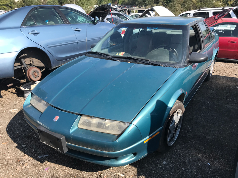 Saturn S-Series sedan in a delightful shade of teal.